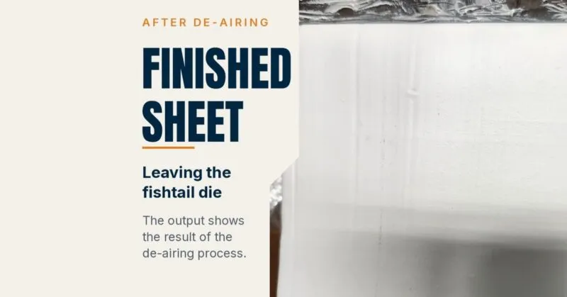 Smooth finished rubber sheet leaving the fishtail die after vacuum de-airing